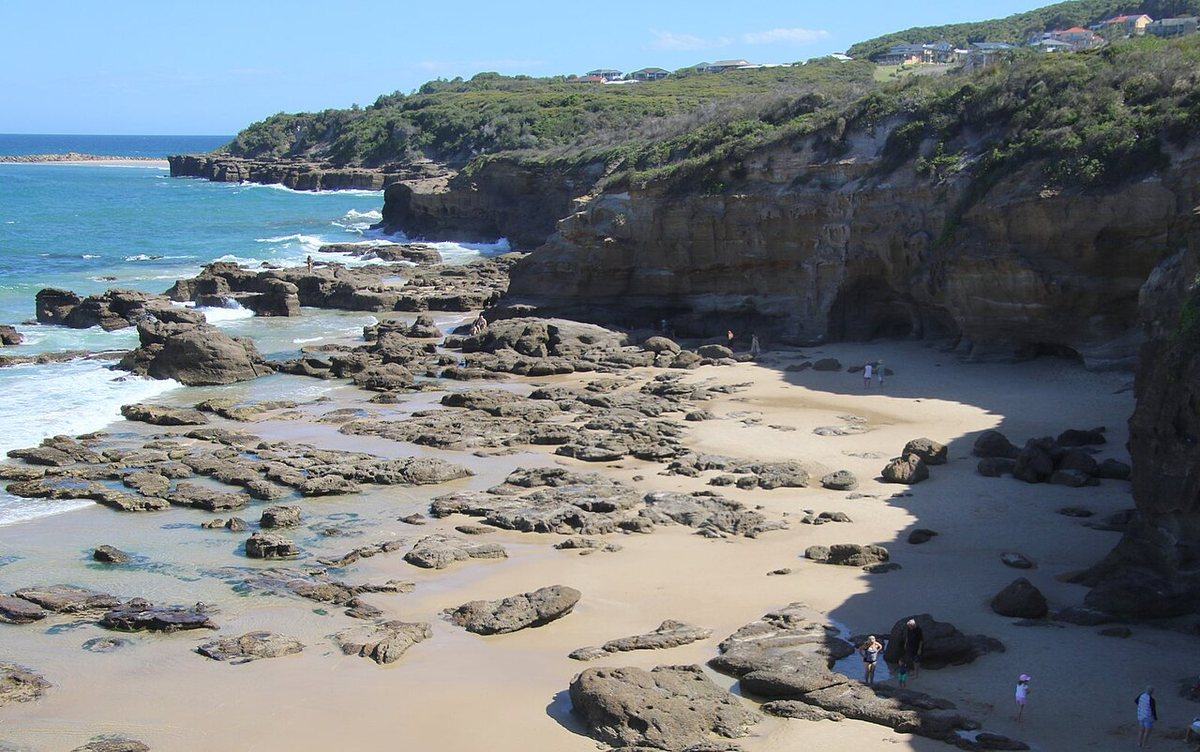 Rock platform, cliffs and sand at Caves Beach, Lake Macquarie, New South Wales